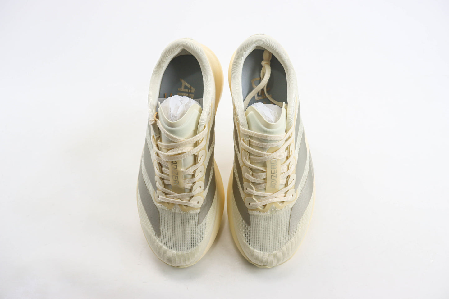 Adizero EVO SL Wonder White Cyber Metallic Warm Vanilla