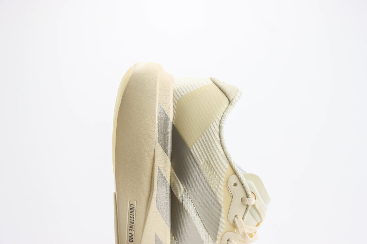Adizero EVO SL Wonder White Cyber Metallic Warm Vanilla